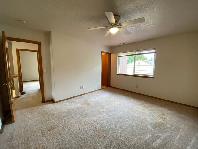 Building Photo - Great Duplex Unit with Attached Garage, Covered Patio, and Two Primary Suites