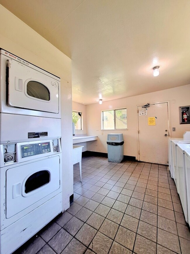 Building Photo - Beautiful 2bd Condo In Gated Community With Pool, Gym, and On-site Laundry