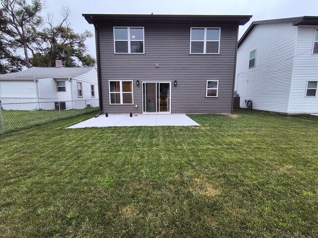 Building Photo - Modern 3-Bedroom Home Near Lake Manawa – Lake Views & Smart Home Features!