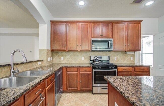 Building Photo - 7814 Heron Lakes Dr
