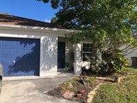 Building Photo - Experience this Large Cape Coral 3 bedroom 2 bath duplex with 1 car garage and screened in lanai.