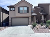 Building Photo - 4 bed | 2 1/2 bath | 2 car garage in Deser...