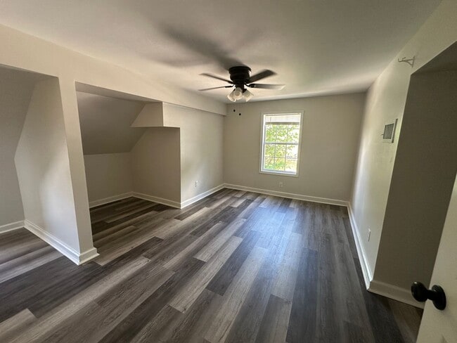 Building Photo - Welcome to this stunning 4-bedroom, 2-bath...