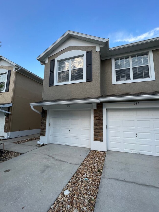 Building Photo - Beautiful 3 Bed 2 Bath with a Den Gated Co...