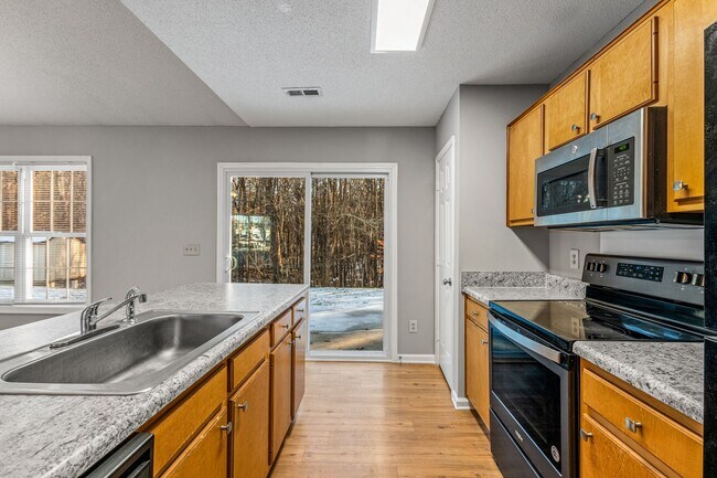 Building Photo - SW - Like New Home, Vaulted LR Ceiling, Fire Place, Wood Flooring, Several Updates!