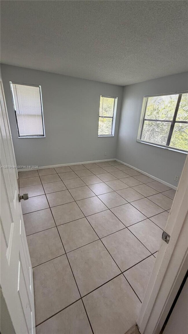 Building Photo - 11641 Royal Palm Blvd