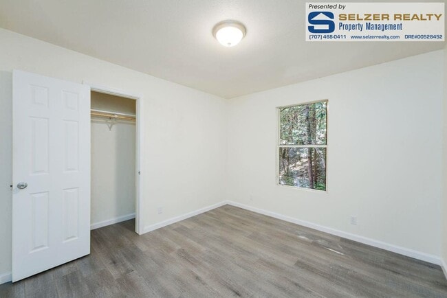 Building Photo - Charming updated 3 bd. Brooktrails home in a lovely setting!