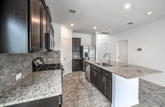 Building Photo - 7024 Vail Ridge St