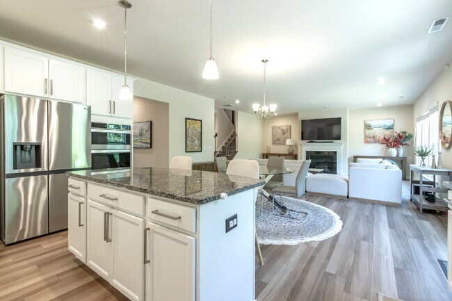 Building Photo - "Discover Spacious Living: 5-Bedroom Craftsman Home in Gated and Amenity-Rich Bretagne with Top-R...
