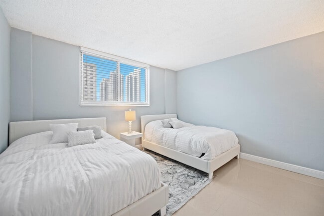 Building Photo - 19380 Collins Ave