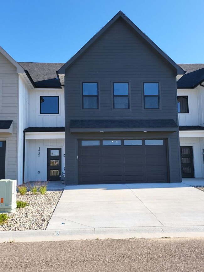 Building Photo - Beautiful New Construction!  3 Bedroom 2.5 Bath Townhome In Sweetgrass!!!!!