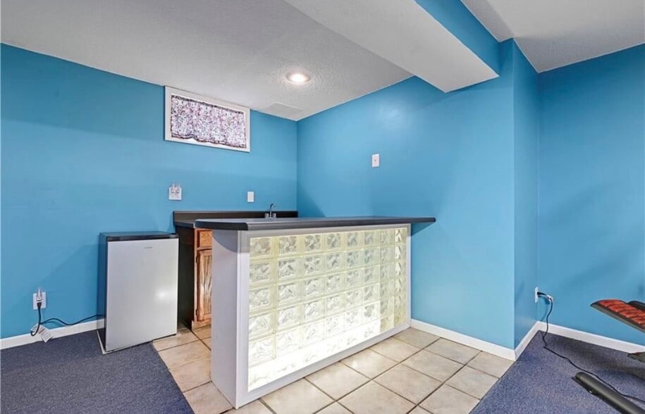 bar in basement - 12417 W 56th St