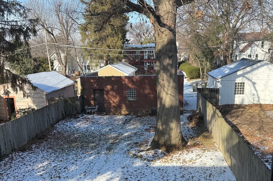 Back yard with scarlet oak tree - 40 W Tompkins St