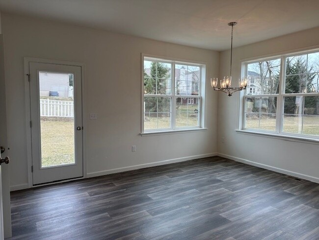 Building Photo - Introducing a end unit town-home 3-bedroom...