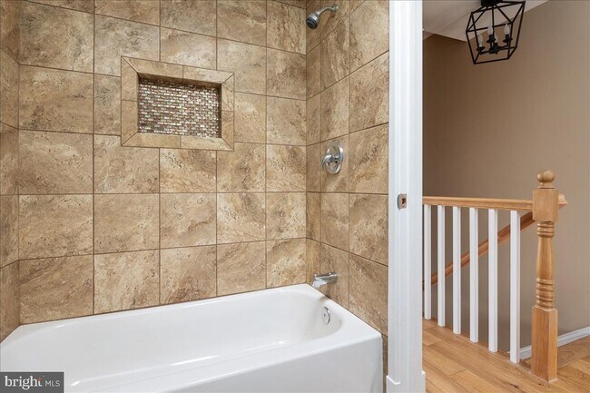 remodeled tile bath tub - 3415 Mount Pleasant Ave
