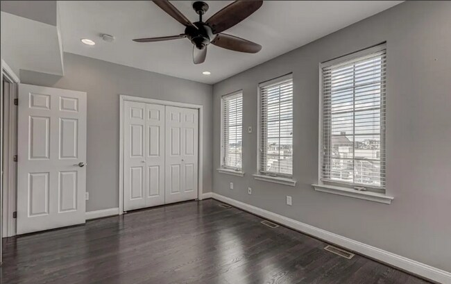 Building Photo - Beautiful EOG 3 bedroom  2.5 bath townhome with a 2 car garage and roof top deck overlooking the ...