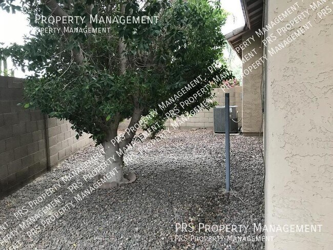 Building Photo - 3935 S Hollyhock Pl
