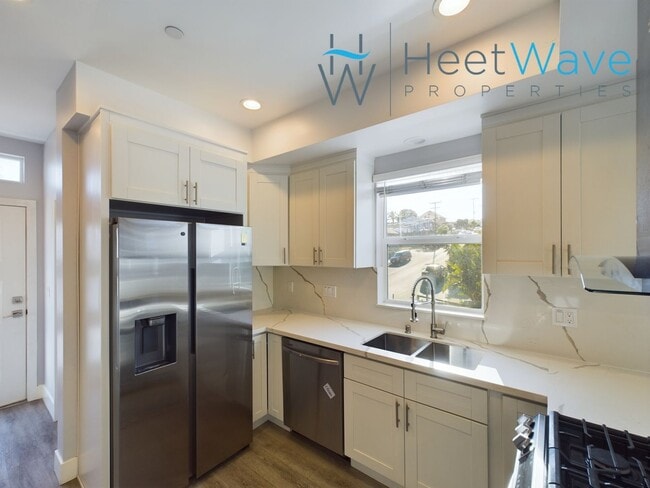 Building Photo - REZKO - E Street