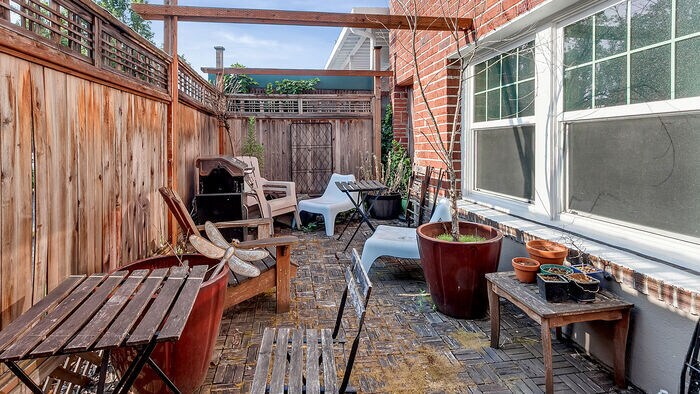 Shared patio with seating area and grill - 1509 NE 10th Ave