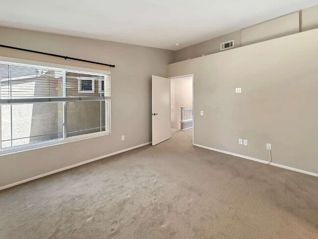 Building Photo - Beautifully Updated End-Unit Townhome in Valencia's Montana Community — No Rear Neighbors!