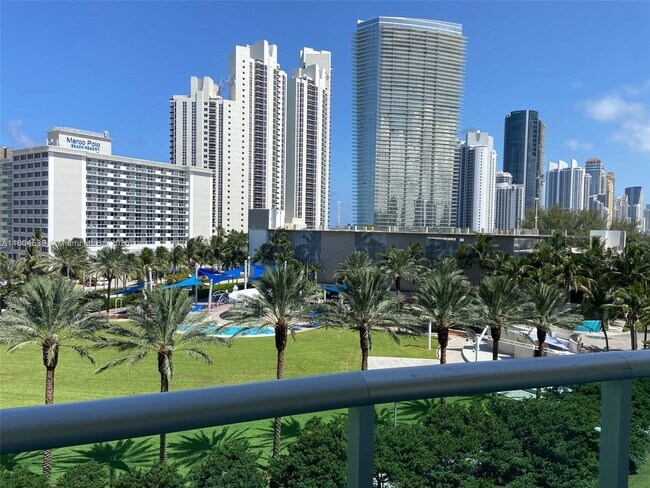 Building Photo - 19370 Collins Ave