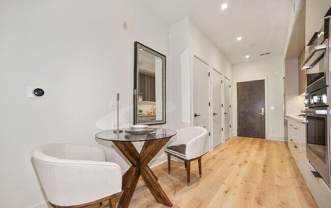Building Photo - One Bedroom Condo in the Heart of the City + Rooftop Deck **Half Month Free on 12 Month Lease**
