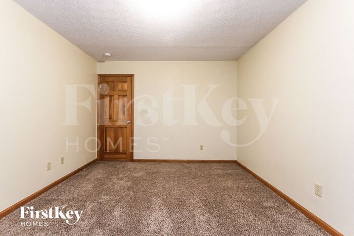 Building Photo - 1027 W Palomino Pl