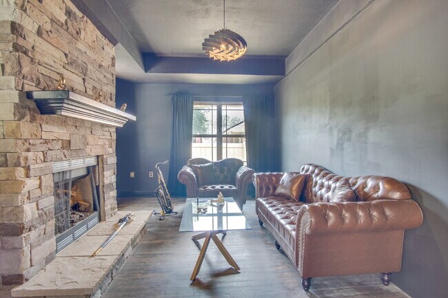 Building Photo - Milton 4BR Pool Home with Office, Vaulted Ceilings, Screened Saltwater Pool & 2-Car Garage