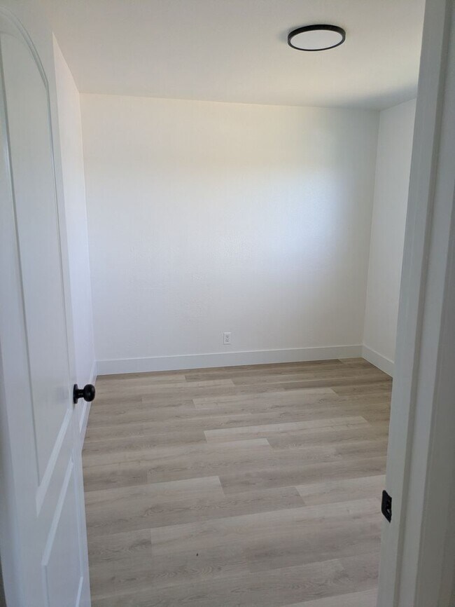 Building Photo - **Spacious 4-Bedroom, 2-Bath Residence with Waterfront & Hillside Views – Vallejo**