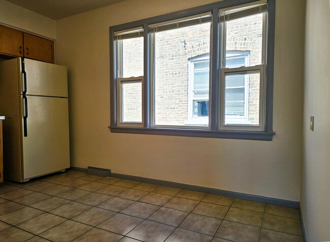 Building Photo - 5950 W Schubert Ave
