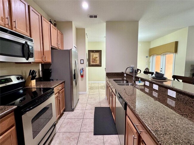 Building Photo - 8977 Coco Palm Rd