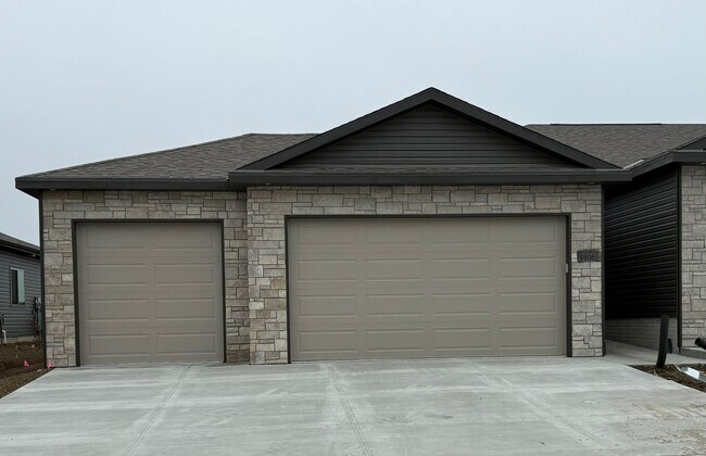 Primary Photo - Brand new ranch townhome with 3 stall gara...