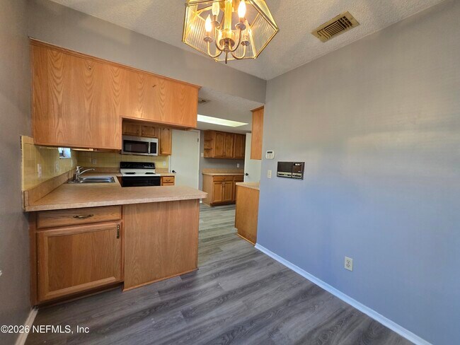 Building Photo - 5639 Sophist Cir N