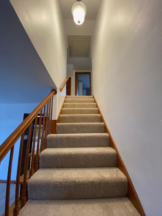 Building Photo - Welcome to this charming three-bedroom, tw...