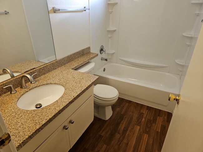 Building Photo - Spacious 4-Bedroom Home with Large Backyard & Covered Patio!