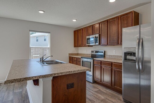 Building Photo - 6473 Flora Court