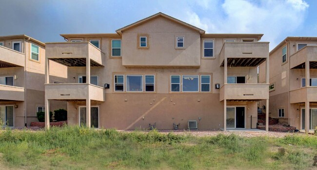 Building Photo - Updated Townhome Near Fort Carson with Unm...