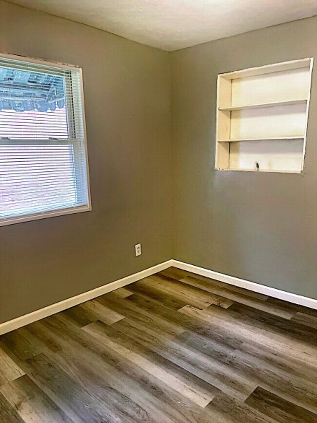 Building Photo - Available now! Great 2 bedroom with AC and detached garage!