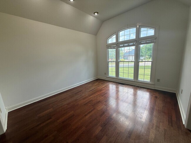 Building Photo - Spacious 5-Bedroom Home on a Corner Lot in...