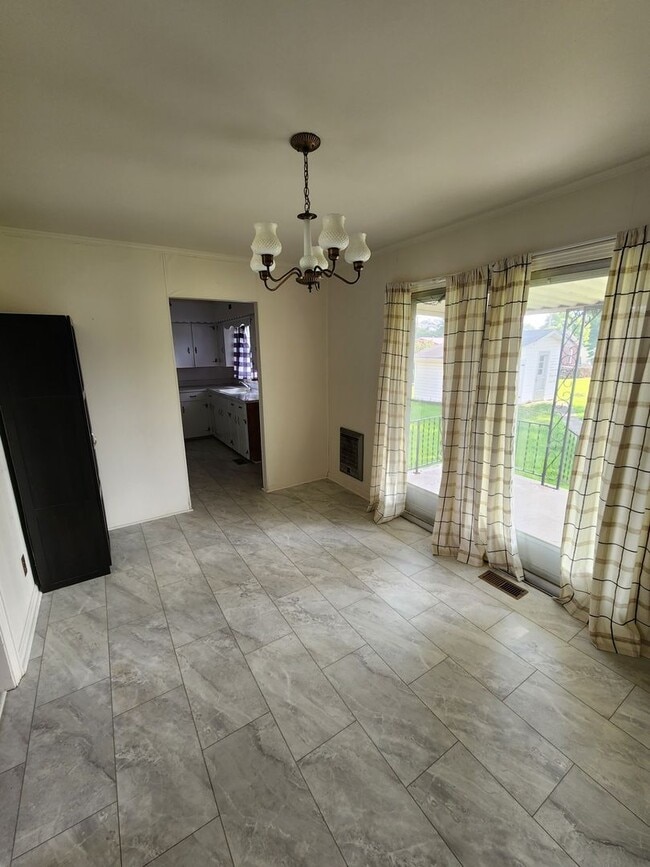 Building Photo - 3-Bedroom Home in Sparta with Hardwood Floors, Carport & Covered Porches