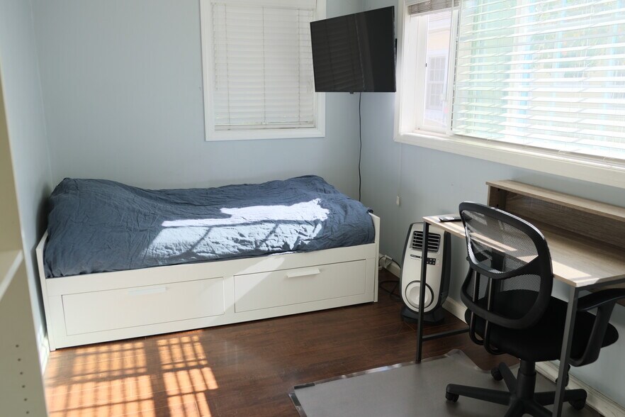 The third bedroom is smaller, but has its own bathroom next to the kitchen - 1243 N Alexandria Ave