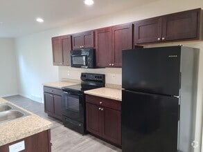 Building Photo - 3 Bedroom Duplex
