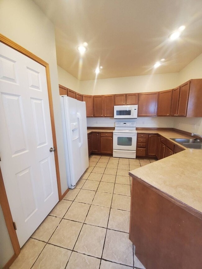 Building Photo - Triple Car Garage & New Interior Paint