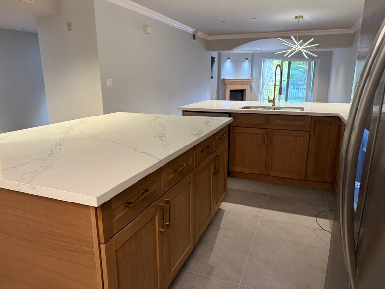 White Oak kitchen with quartz countertops - 6221 Monterey Rd