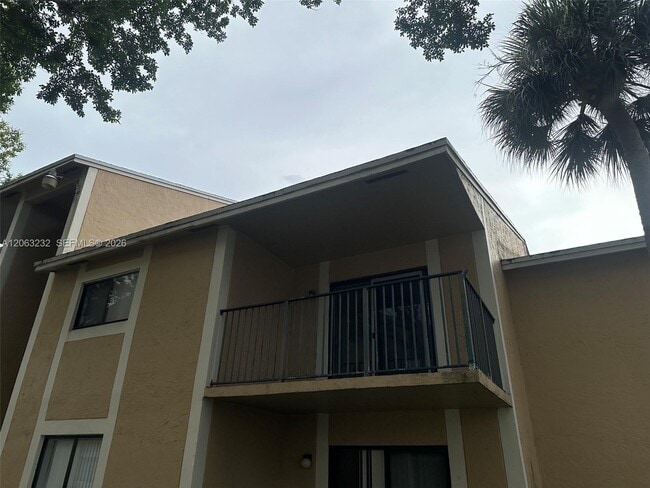 Building Photo - 9491 Palm Cir S