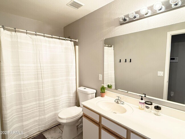 Building Photo - 6757 W Gardenia Ave