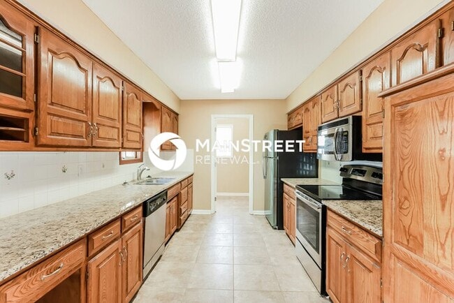 Building Photo - 4 Bedroom Pet-Friendly Home in Lansing, KS with Main Street Renewal
