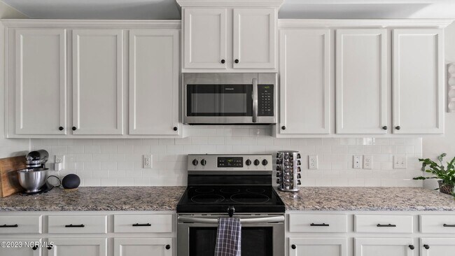 Building Photo - 4BR Home in The Landing at Mill Creek | Bonus Room + Fenced Yard w/ Pergola