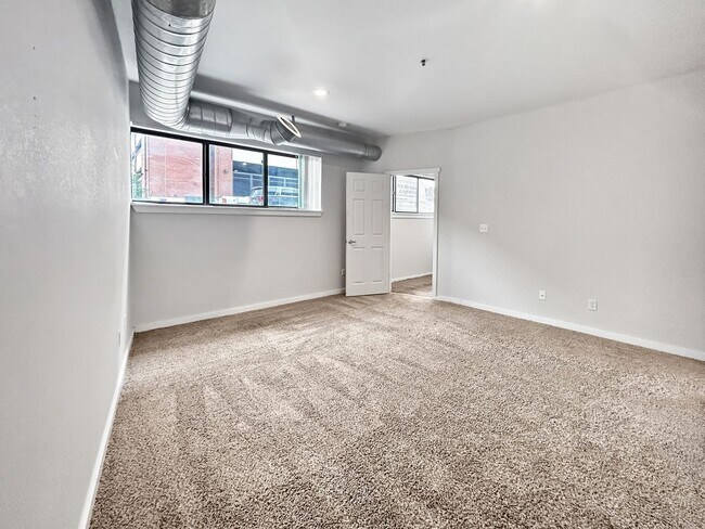Building Photo - $0 DEPOSIT OPTION. 2 BED 2.5 BATH CONDO AT STUDIO 70 IN DENVER'S GOLDEN TRIANGLE. PARKING INCLUDED!