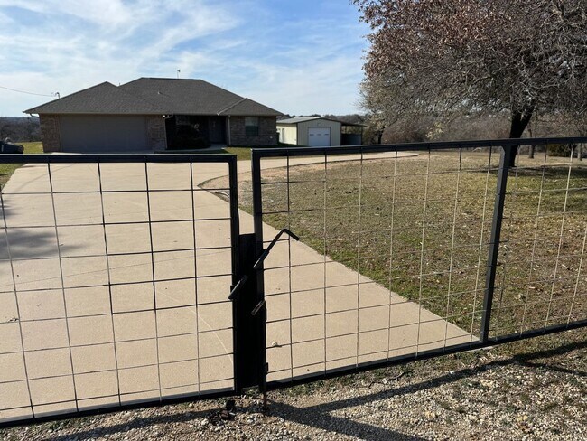 Building Photo - 4 Acres + METAL SHOP + Horses Welcome